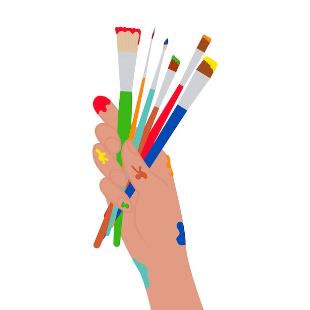 Vector human hand holding paint brushes