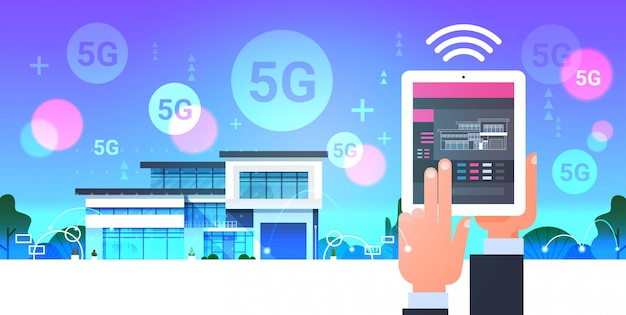 디지털 태블릿 온라인 모바일 앱 스마트 홈 시스템 제어 5g 온라인 무선 통신 현대 집 자동화 개념 수평을 사용하는 인간의 손