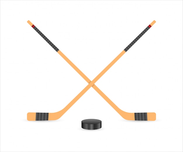 IJshockey puck en stokken.
