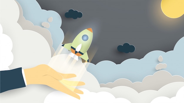 Illustration with start up concept in paper cut, craft and origami style. rocket is flying.