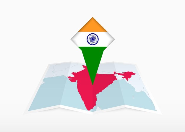 Vector india wordt afgebeeld op een gevouwen papieren kaart met een plaatsmarkering met de vlag van india.