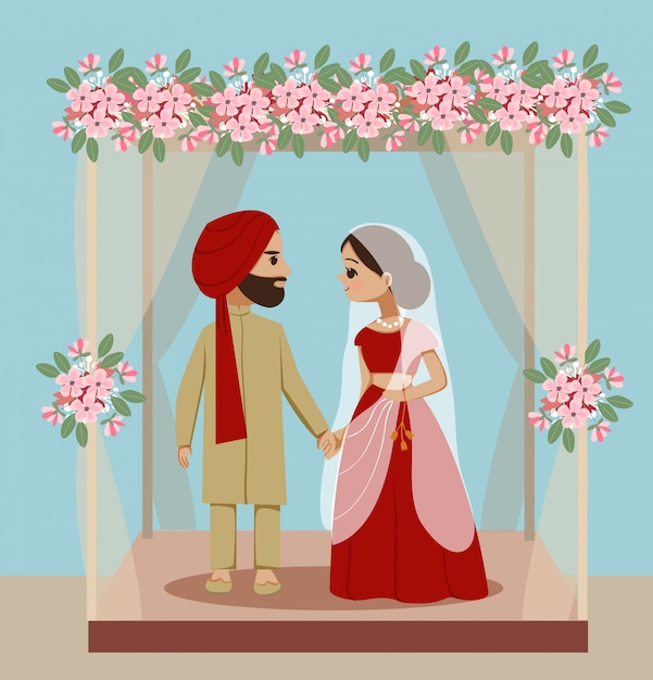 Индийская свадебная пара под украшением мандапса