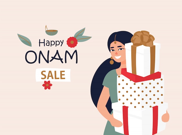 Onam 축제를위한 선물 상자를 가진 인도 여자