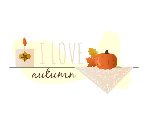 La scritta amo l'autunno, la candela e la zucca