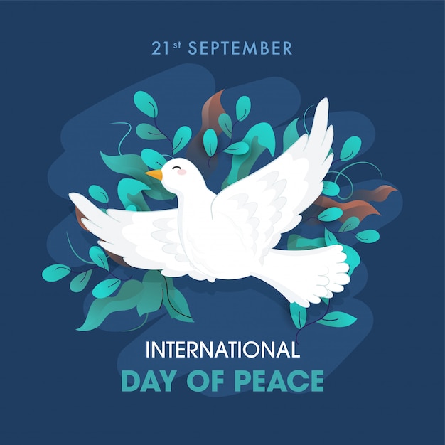 International day of peace text with dove flying and olive leaves decorated on blue background .