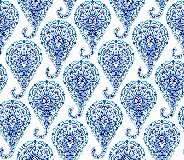 Intricate indigo paisley pattern traditional persian seamless pattern almond shape curving teardrop with floral elements blue white flower design hippie boho chic vector fashionable fabric