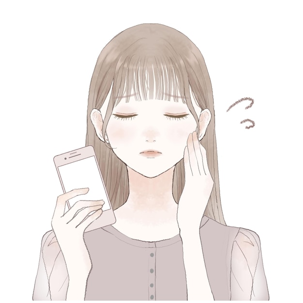 スマホを持っている女性です。困った表情です。