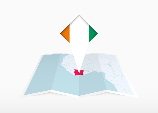 코트디부아르는 접힌 종이 지도와 코트디부아르 국기와 함께 고정된 위치 표시에 그려져 있습니다.