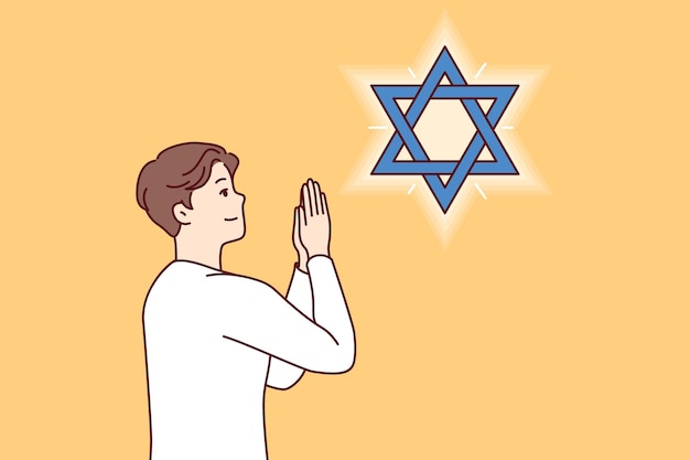 Jewish man teenager prays looking at star of david observing ritual in preparation for shabbat