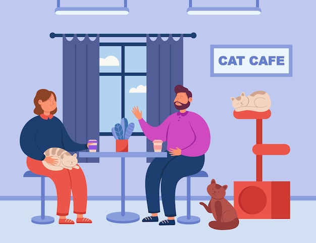 Jong tekenfilmpaar zit in kattencafé en drinkt koffie