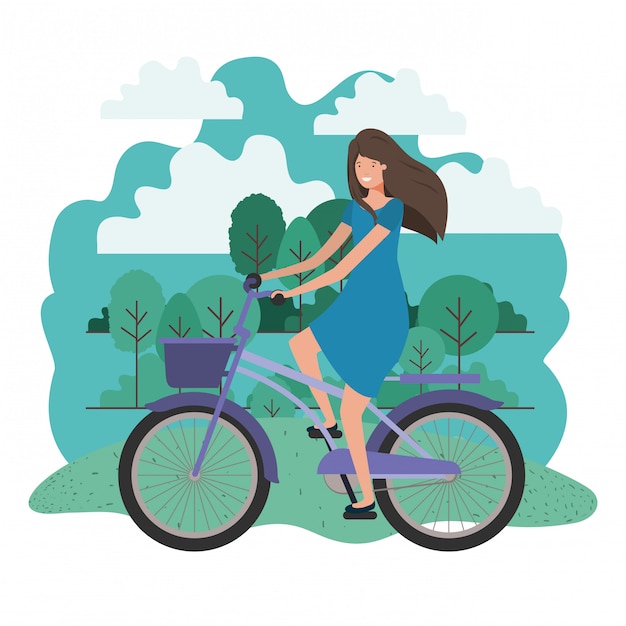 Jonge vrouw in fiets op het park