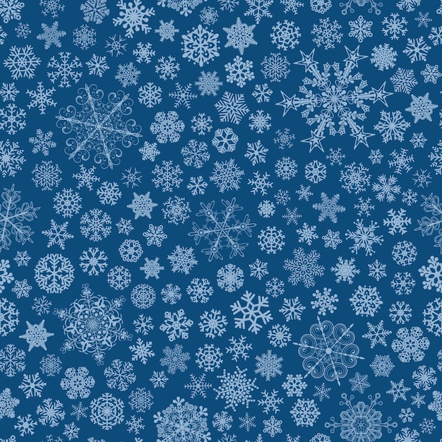 Kerst naadloos patroon van grote en kleine sneeuwvlokken, lichtblauw op blauw