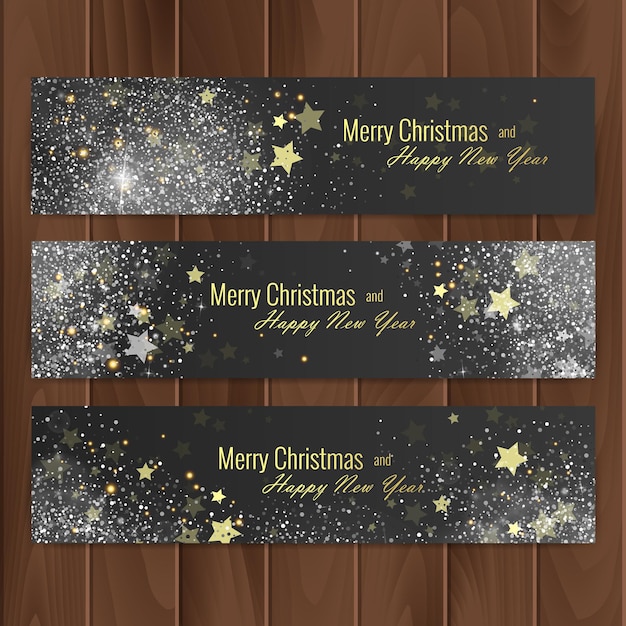 Kerstbanners op houten ondergrond