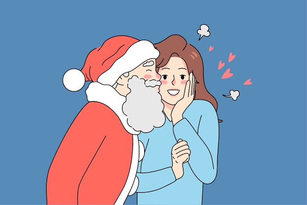 Kerstman kus jonge vrouw