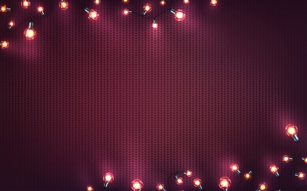 Kerstmisachtergrond met Kerstmislichten. Vakantie gloeiende slingers van LED-lampen op paarse gebreide textuur