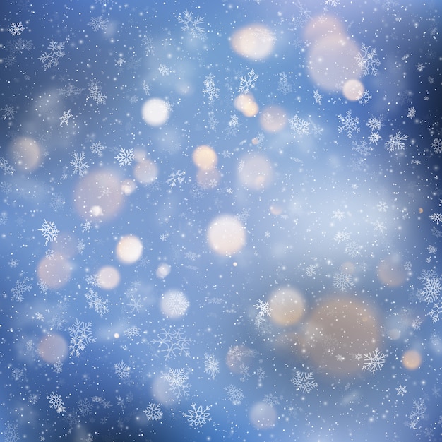 Kerstmisachtergrond met sneeuw en bokeh lichten.