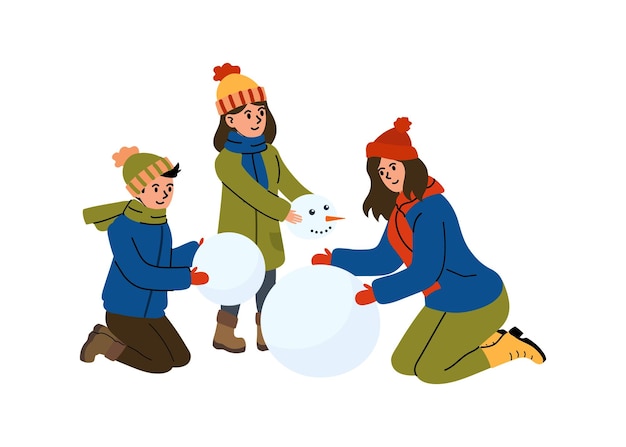 Kinderen bouwen samen een sneeuwman in de winter in een besneeuwd landschap