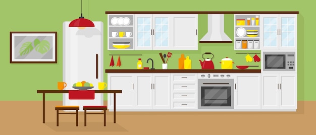 Interiore della cucina con mobili, frigorifero, microonde, tavola e stoviglie.