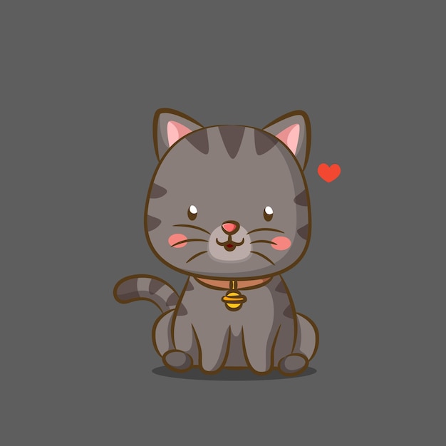 kleine kat met bel aan zijn ketting en schattig gezicht zitten