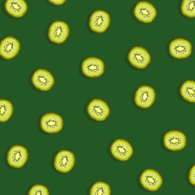 Kleurrijk fruitpatroon van verse kiwiplakken op groene achtergrond