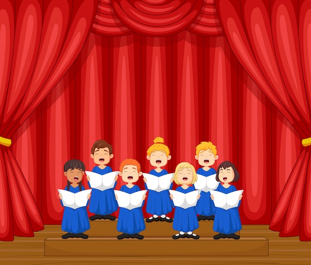 Koorkinderen zingen een lied op het podium