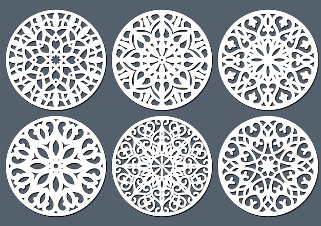 Vector laser cut wood coasters set. geometric decorative mandala designs.