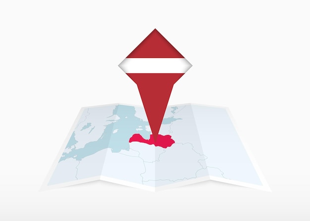 Latvia is depicted on a folded paper map and pinned location marker with flag of Latvia