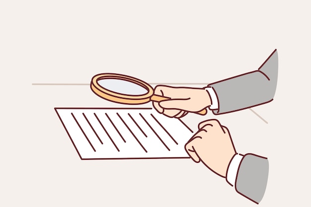 Lawyer hands with magnifying glass over contract for concept of checking documents for errors