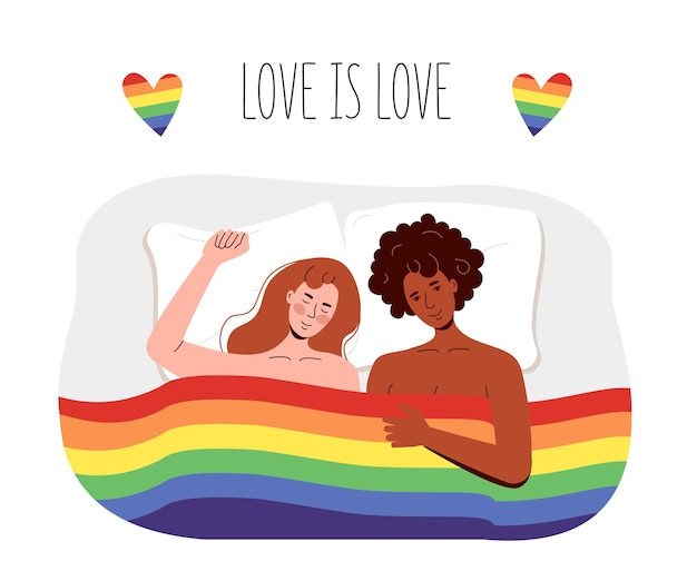 Lesbian women lie under the rainbow flag of lgbt. Girls are engaged in interracial free sex