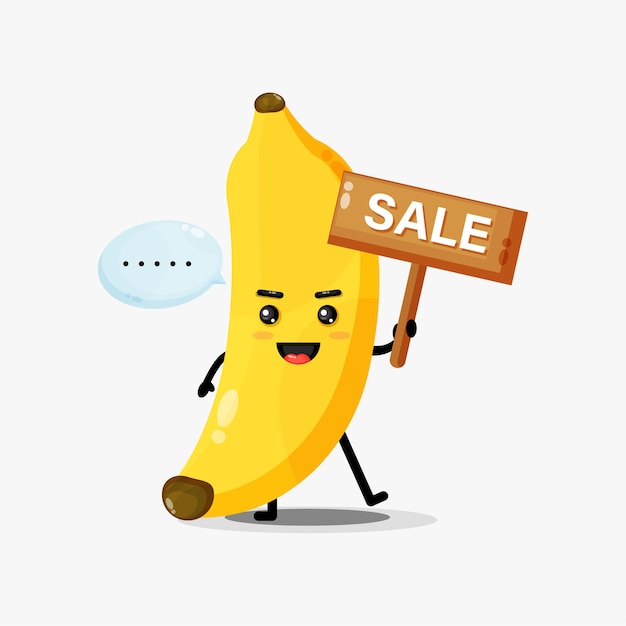 Leuke bananenmascotte met een verkoopteken