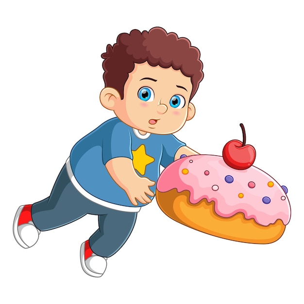 Leuke jongen die een grote donut vasthoudt en uitglijdt