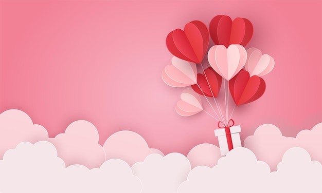 Liefde hart ballon en cadeau vliegen over wolk. valentijnsdag wenskaart posters en behang.