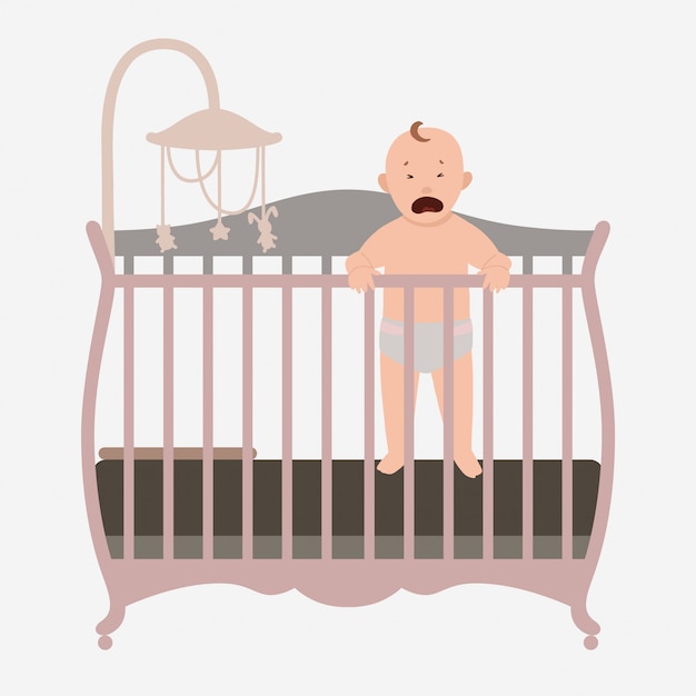 Piccolo bambino che piange nel letto.