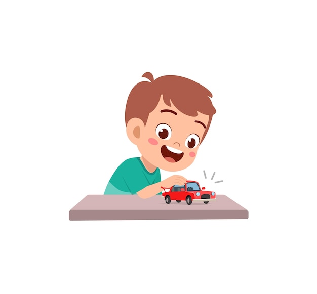 Little boy play with small toy car