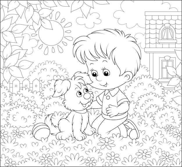 Little boy playing with a small pup among flowers on a lawn in front of his house on a sunny day