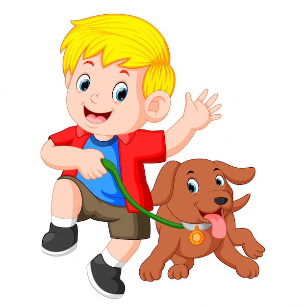 Little boy running with dog