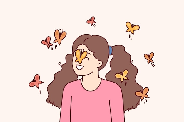 Little girl among butterflies flying and landing on face for spring mood concept