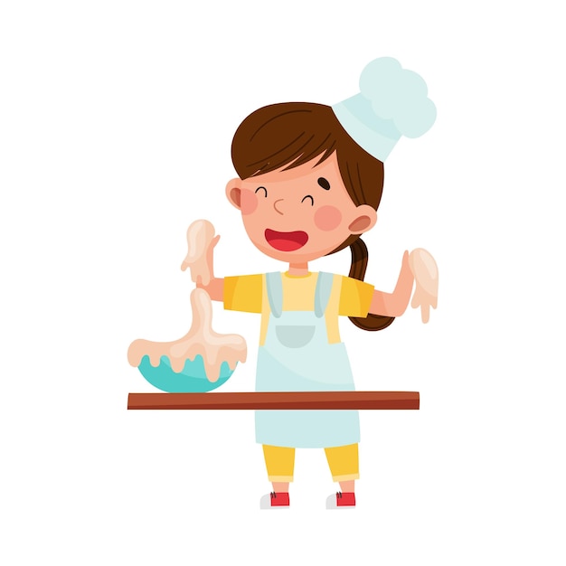 Vector little girl character in hat and apron standing at kitchen table and kneading dough vector illustration