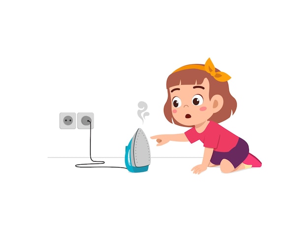 Little girl curious to touch hot electric iron