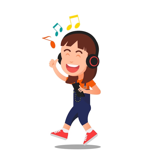 A little girl happily listening to music