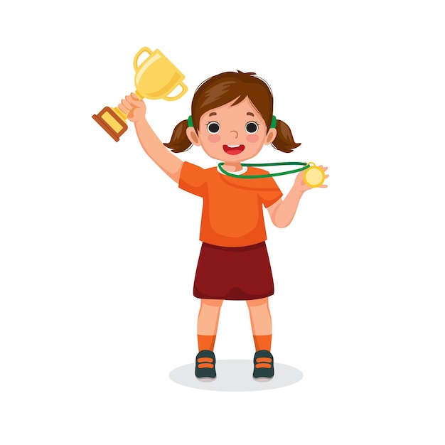 Little girl holding up a gold cup trophy and medal celebrating winning competition award