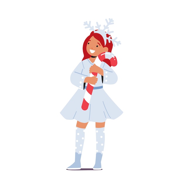 Bambina in costume fiocco di neve bambino allegro in vestito di natale divertente che tiene candy cane kid esibendosi su matinee