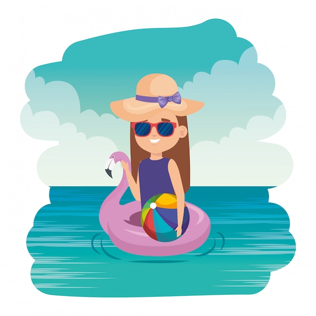 little girl with flemish float and beach balloon on the sea