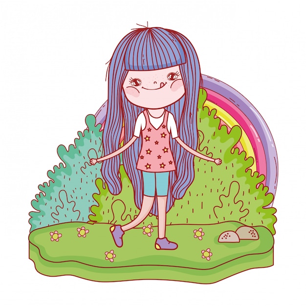 Little girl with rainbow in the landscape