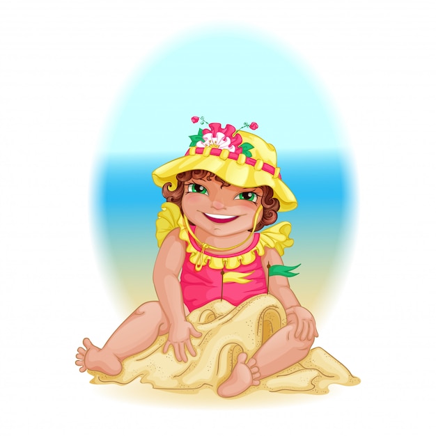 Little girl in the yellow hat builds a sand castle on the beach.