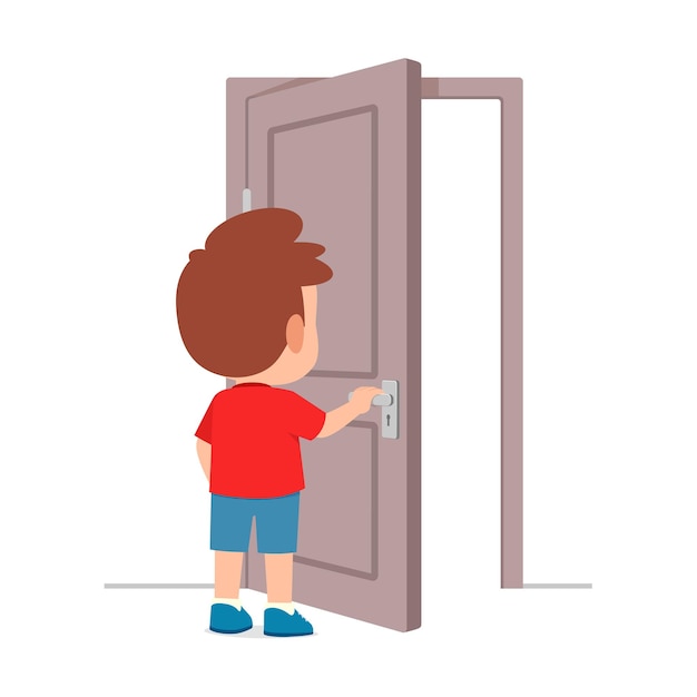 Маленький ребенок стоит и держит дверную ручку