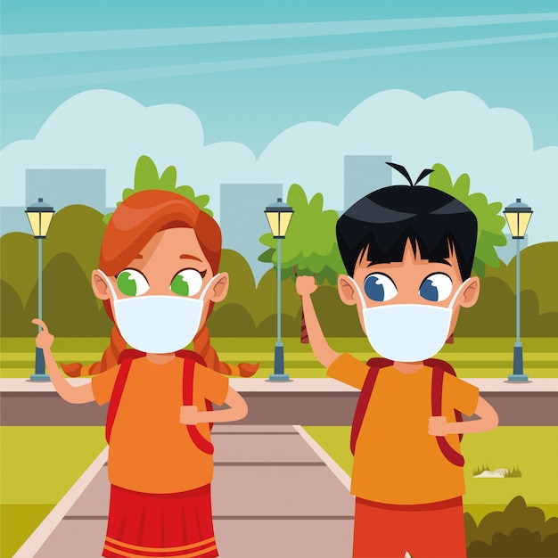 Little kids couple using face masks for covid19 in the park