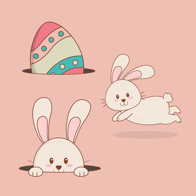 Vector little rabbits with egg painted easter characters