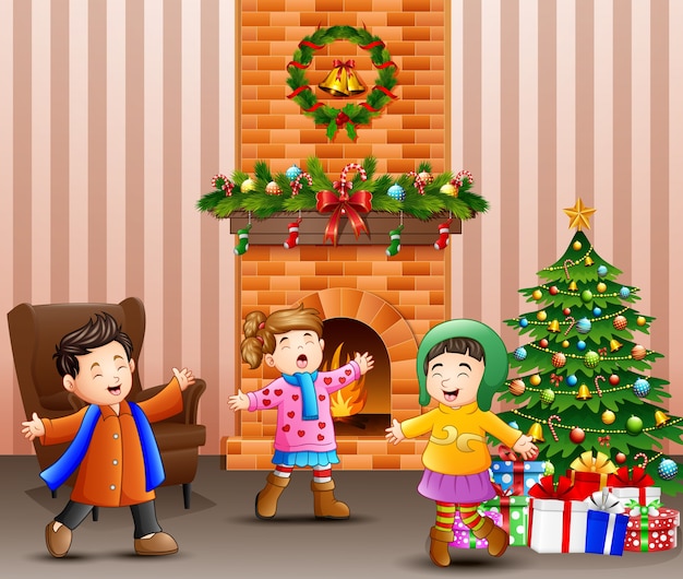 Decorazione del soggiorno per natale e anno nuovo con bambini che cantano