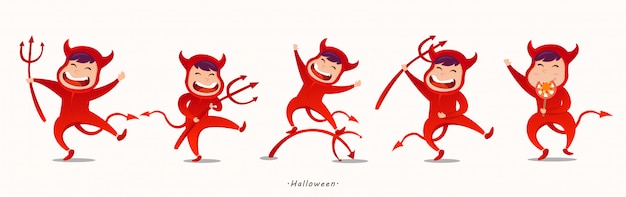 Lovely kids in halloween devil costumes.